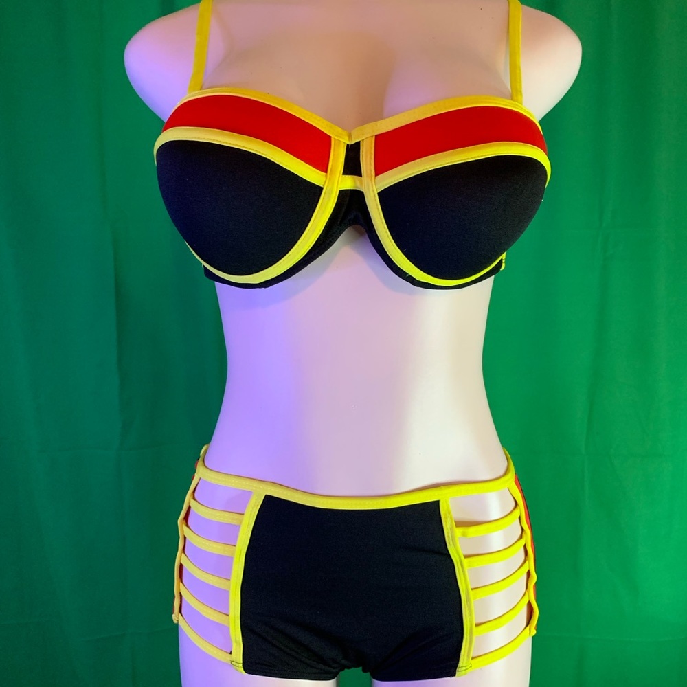 Women’s swimsuit black, yellow and red with side cuts